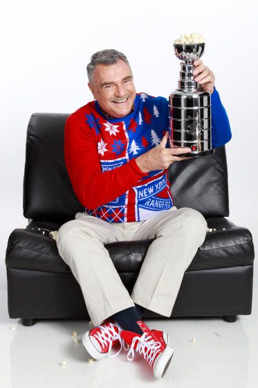 Rick Zahn Holding A Trophy